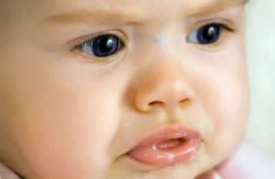 infant clear mucus spit up